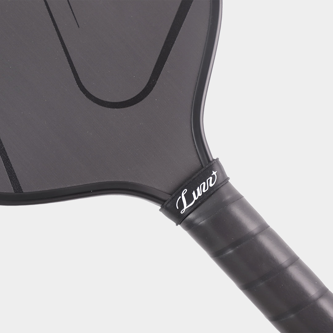 Luzz Pro 4 Inferno pickleball paddle - Darkness Inferno colourway - grip and throat detail