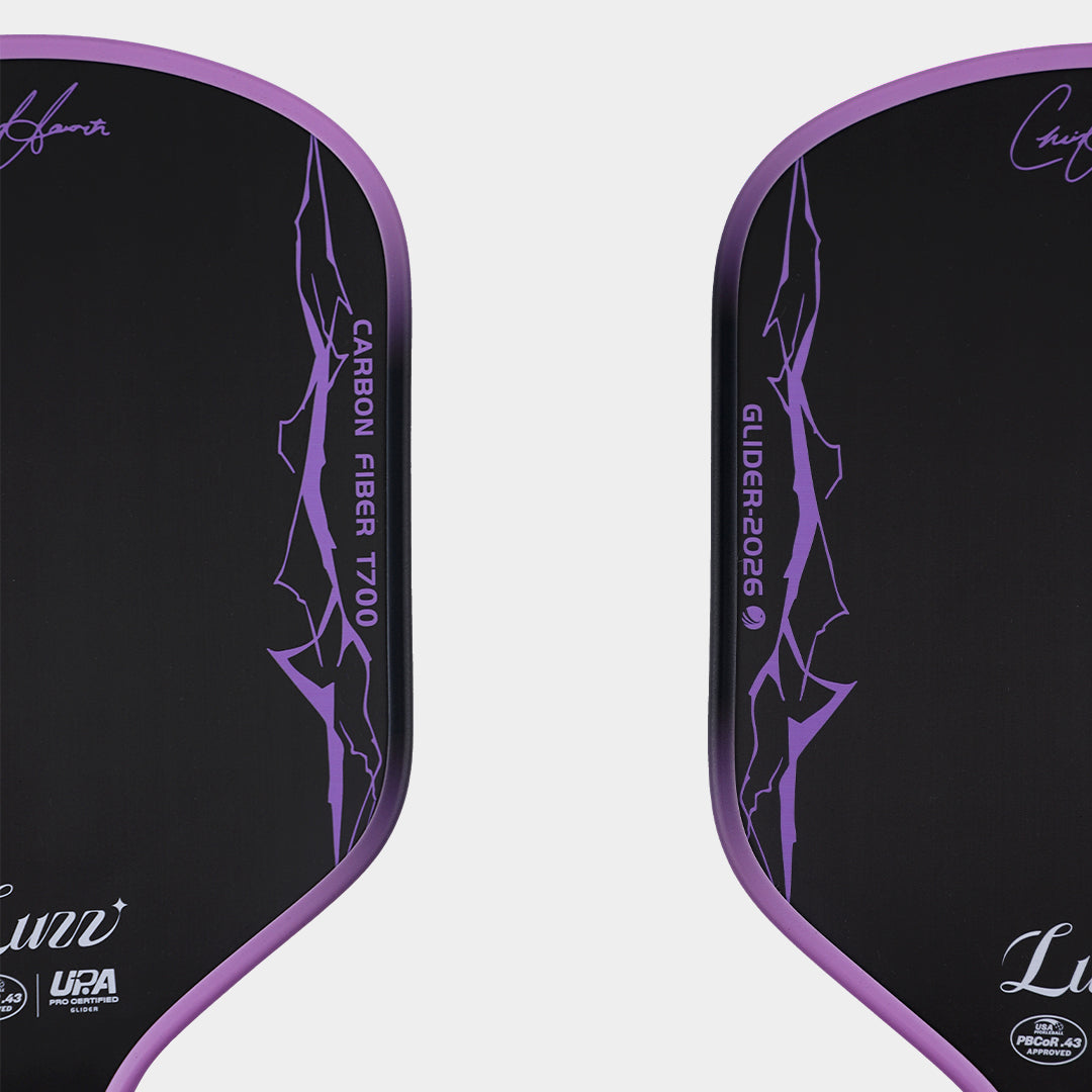 Luzz Chris Haworth Glider 2026 pickleball paddle - surface macro showing the Chris Haworth signature, T700 carbon fibre and UPA-A badge