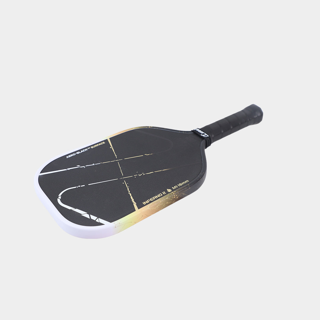 Luzz Inferno2 M1 Dawn pickleball paddle - laid flat at an angle