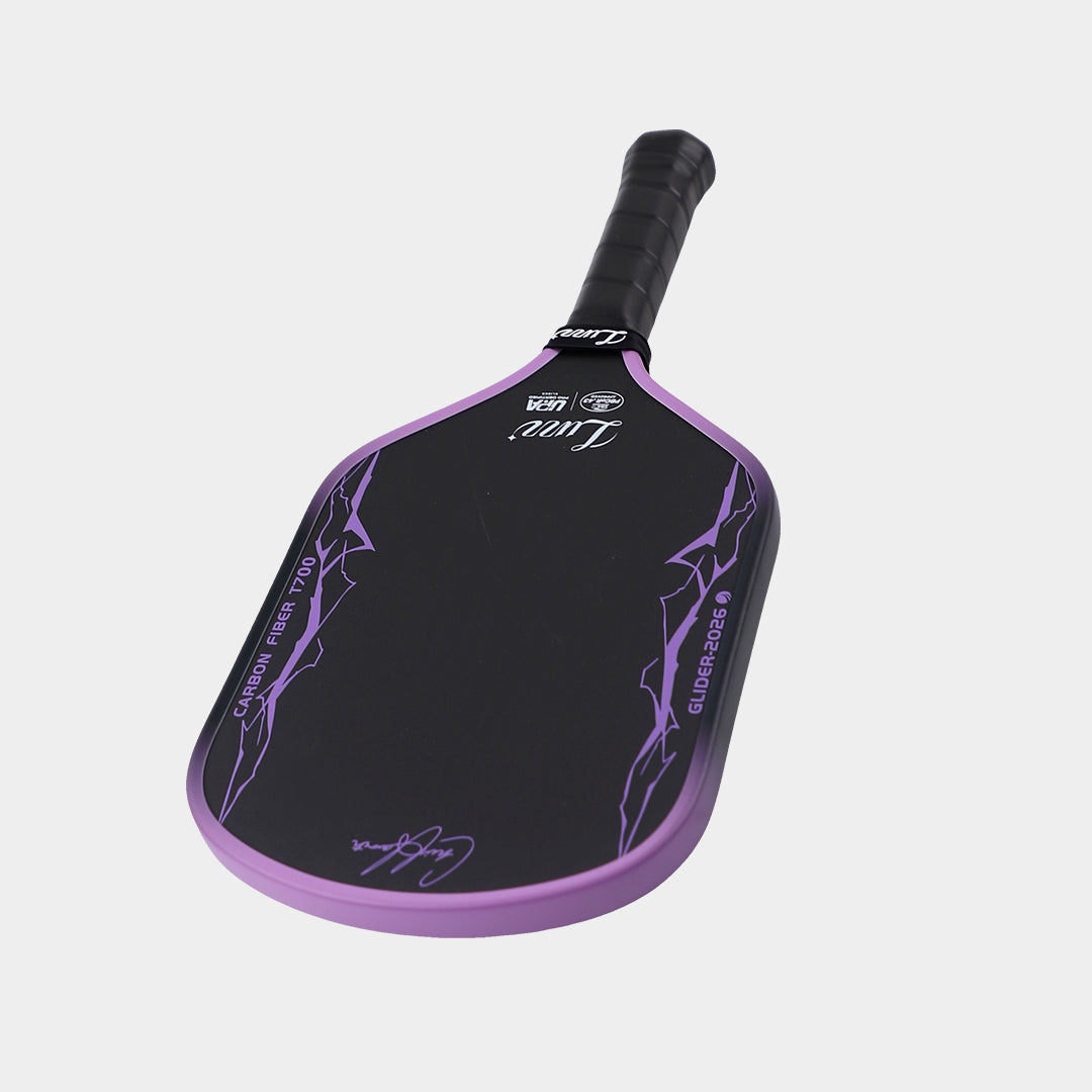 Luzz Chris Haworth Glider 2026 pickleball paddle - laid flat at an angle showing the full hybrid shape