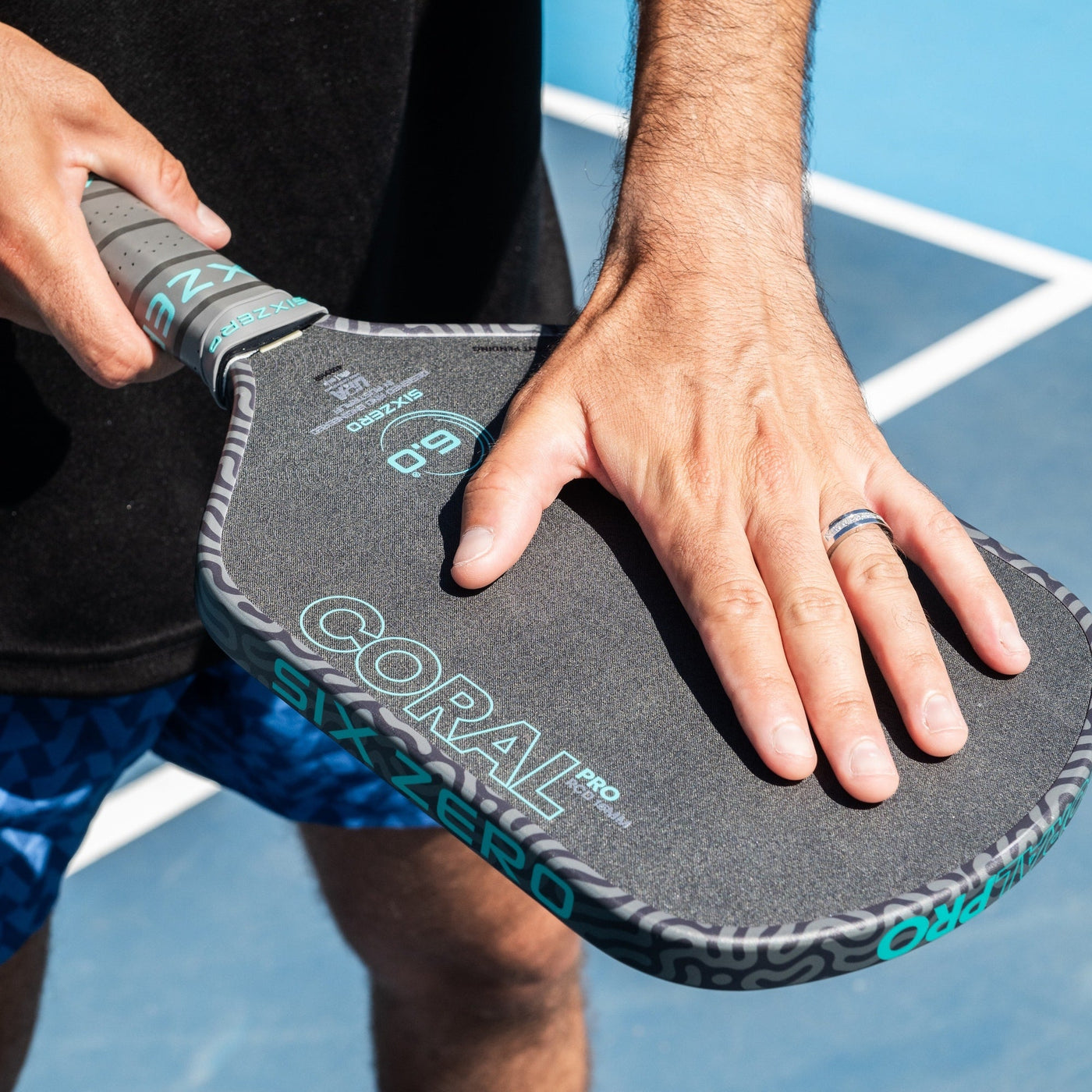Six Zero Coral Pro pickleball paddle — studio photo