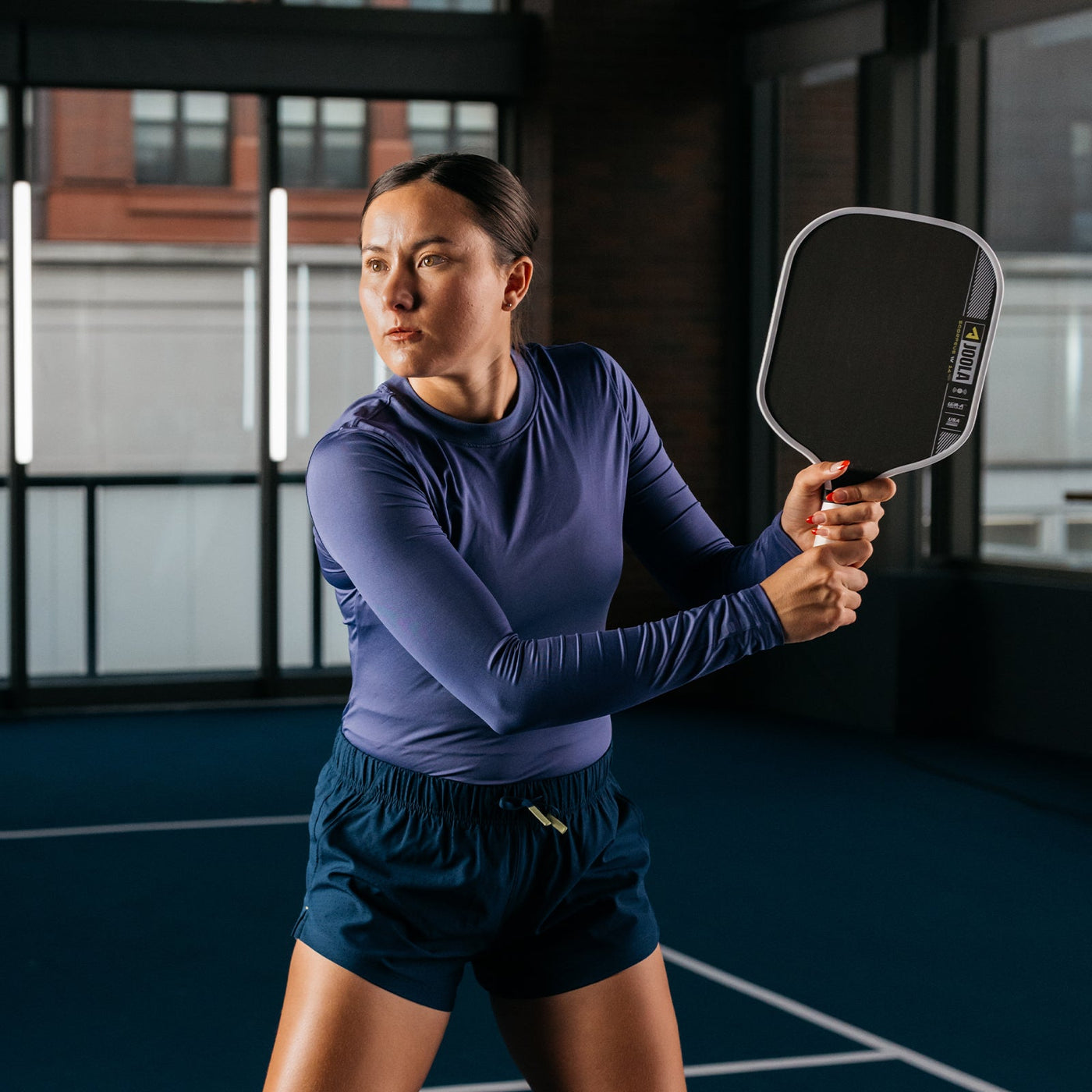 JOOLA Anna Bright Scorpeus Pro IV 14mm pickleball paddle in play