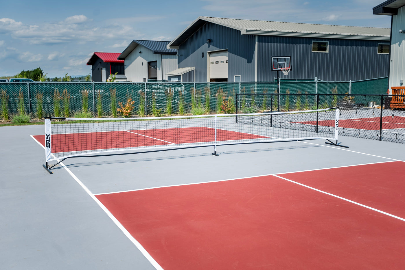 Selkirk SLK Prime Portable Pickleball Net — tension adjustment straps
