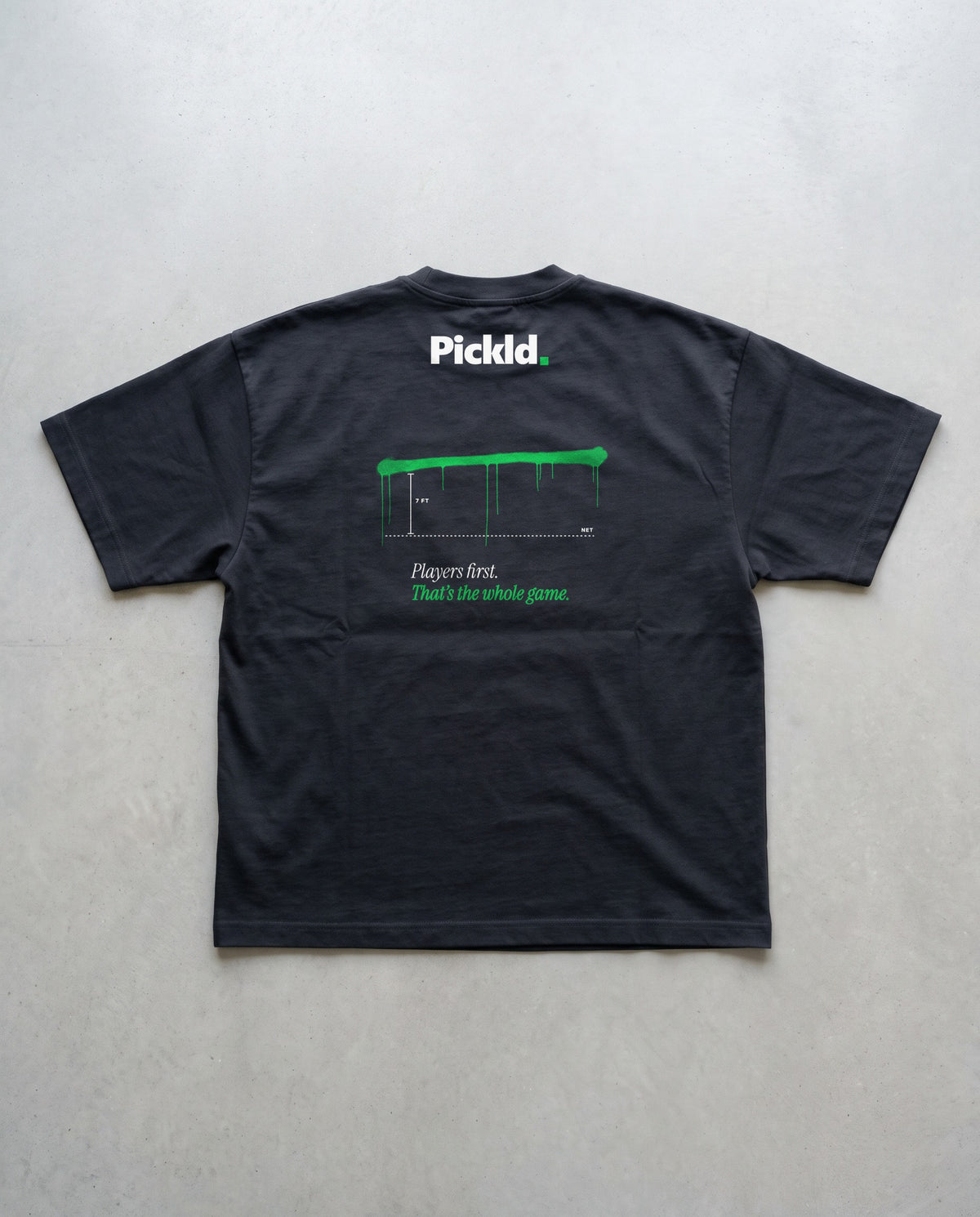 Pickld Kitchen Line tee, back print, on a black AS Colour Block Oversized Tee