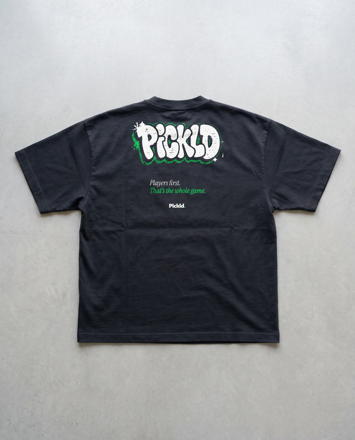 Pickld Throw Up tee, back print, on a black AS Colour Block Oversized Tee
