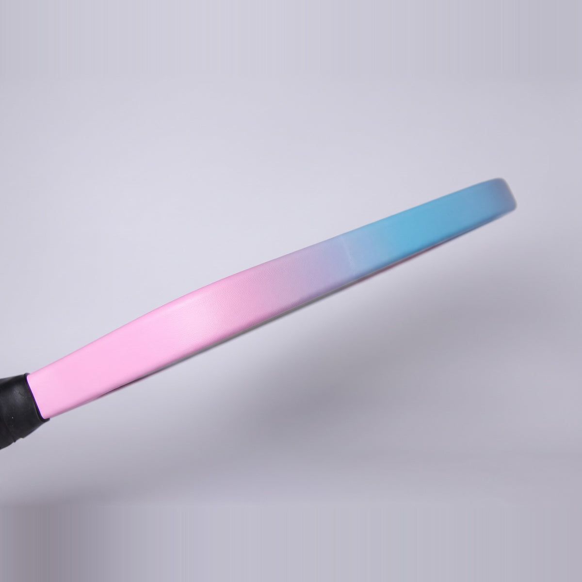 Pickleball Labs Edge Guard - Ocean Blossom colourway - fitted to a paddle edge