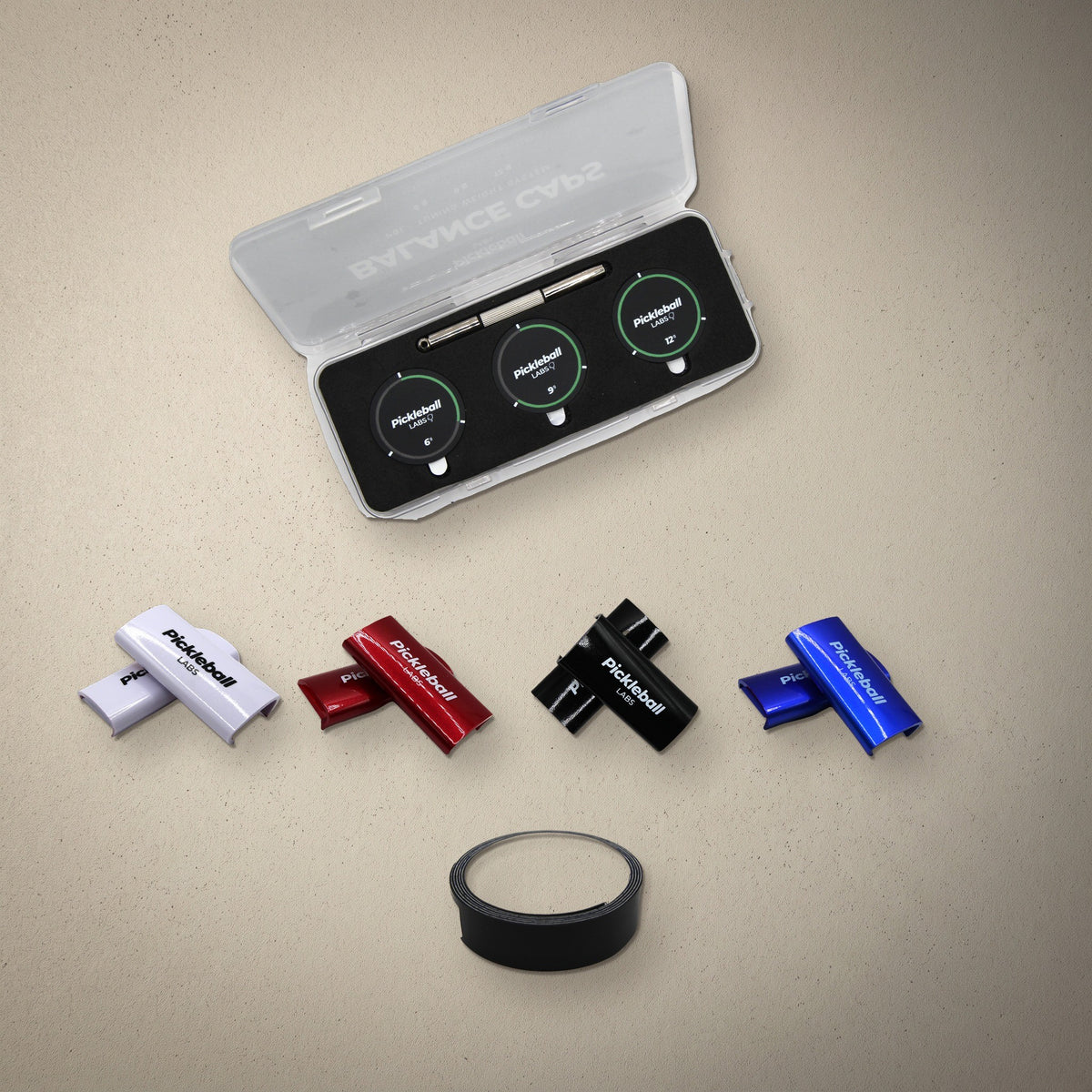 Pickleball Labs tuning weights in the Ultimate Paddle Kit: balance caps, weighted clips and tungsten tape