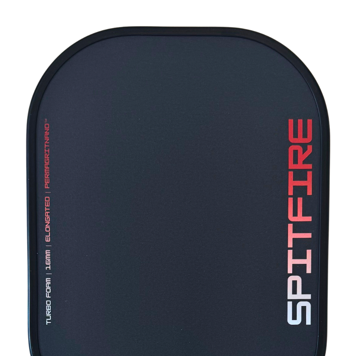 Head of the Spartus Spitfire Elongated 16mm pickleball paddle, showing the red SPITFIRE print and the Turbo Foam 16mm Elongated PermaGritNano spec line on the black grit face